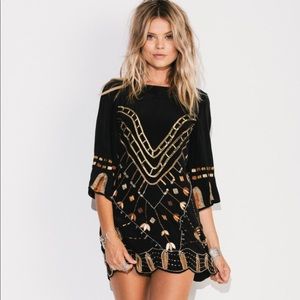 Jen’s pirate booty black magic dress in ivory